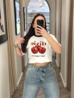 T-SHIRT BRANCA COM MAÇÃS MAKE IT GOOD ONE DIXIE