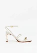 SANDÁLIA OFF WHITE EM PELE COM APLICAÇÃO DOURADA LANÇA PERFUME - Image 2