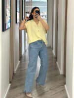 CALÇA DE GANGA COM APLICAÇÕES EM CORAÇÃO PONTO CHIC