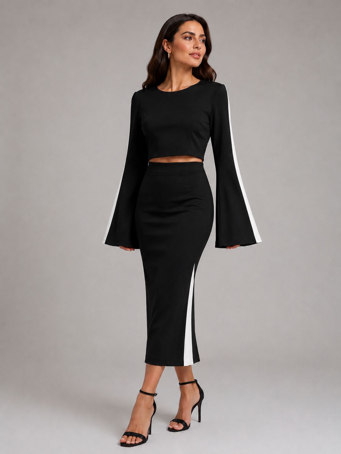 WhatsApp Image 2026-05-25 at 11.36.58 TOP PRETO COM MANGAS BICOLOR RINASCIMENTO - Image 1
