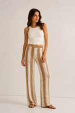 CALÇA EM MALHA ÀS RISCAS BICOLOR RUGA